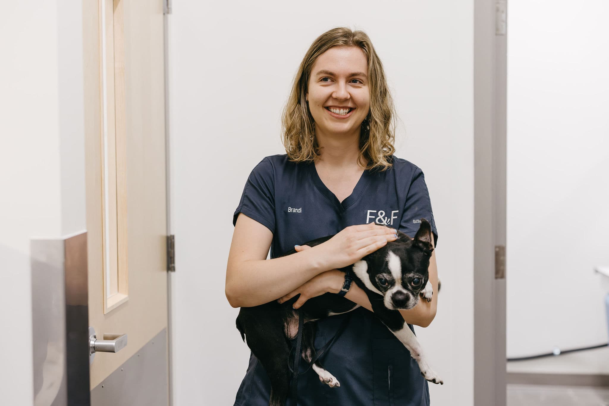 Brandi holding a Felix&Fido member